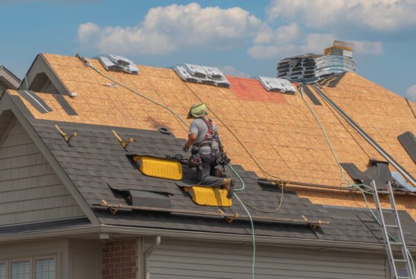 Roof workers installing a new roof